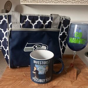 Seahawks lunch bag and wine glass and step brothers mug. 
Used